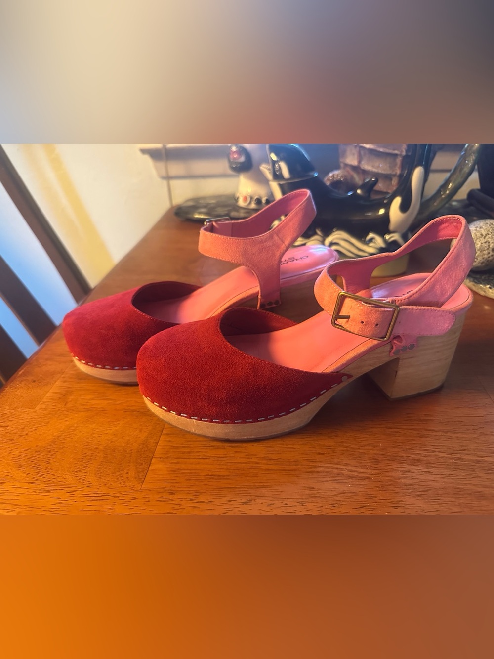 Charlotte Stone pink and red ankle strap clogs